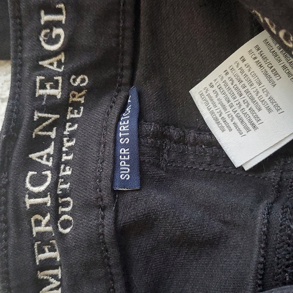 American Eagle Black Distressed Super Stretch  Mid Rise Jegging Size 4 Waist 27 - Picture 3 of 6